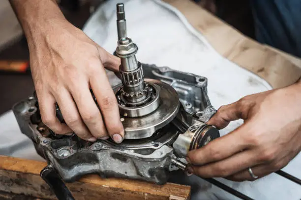 Motorcycle engine crankshaft replacing by a mechanic
